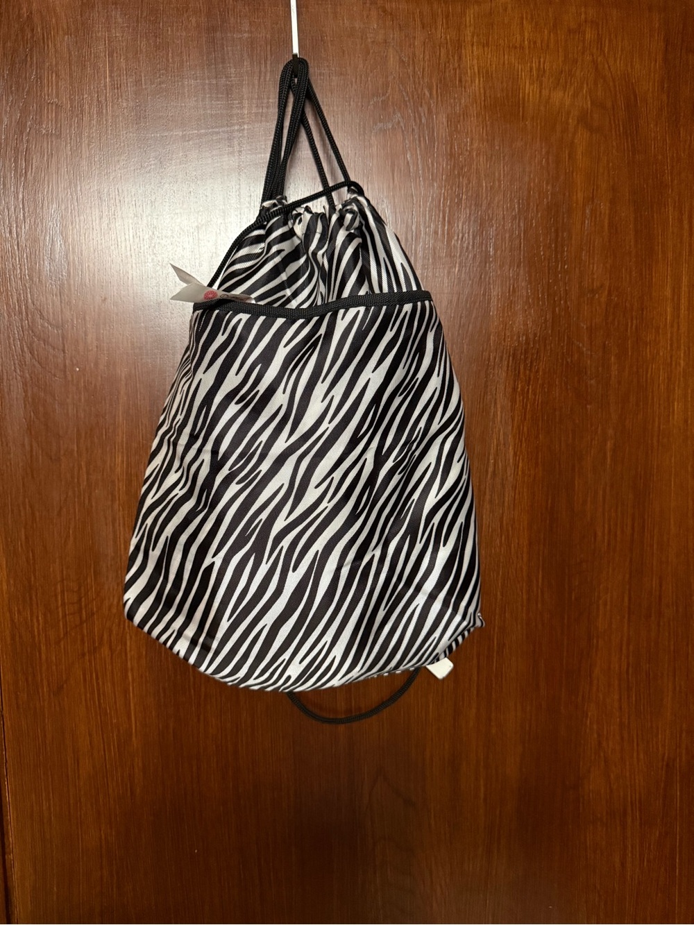Penelope Ann Zebra Print Drawstring Backpack